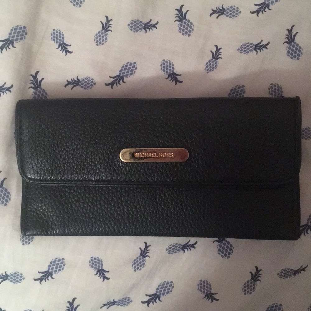 Michael kors black wallet.